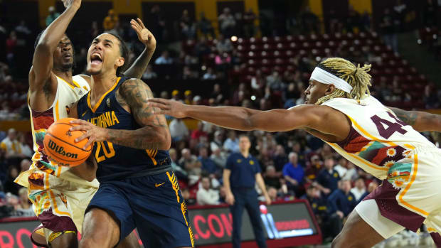 Jaylon Tyson drives against ASU defenders.